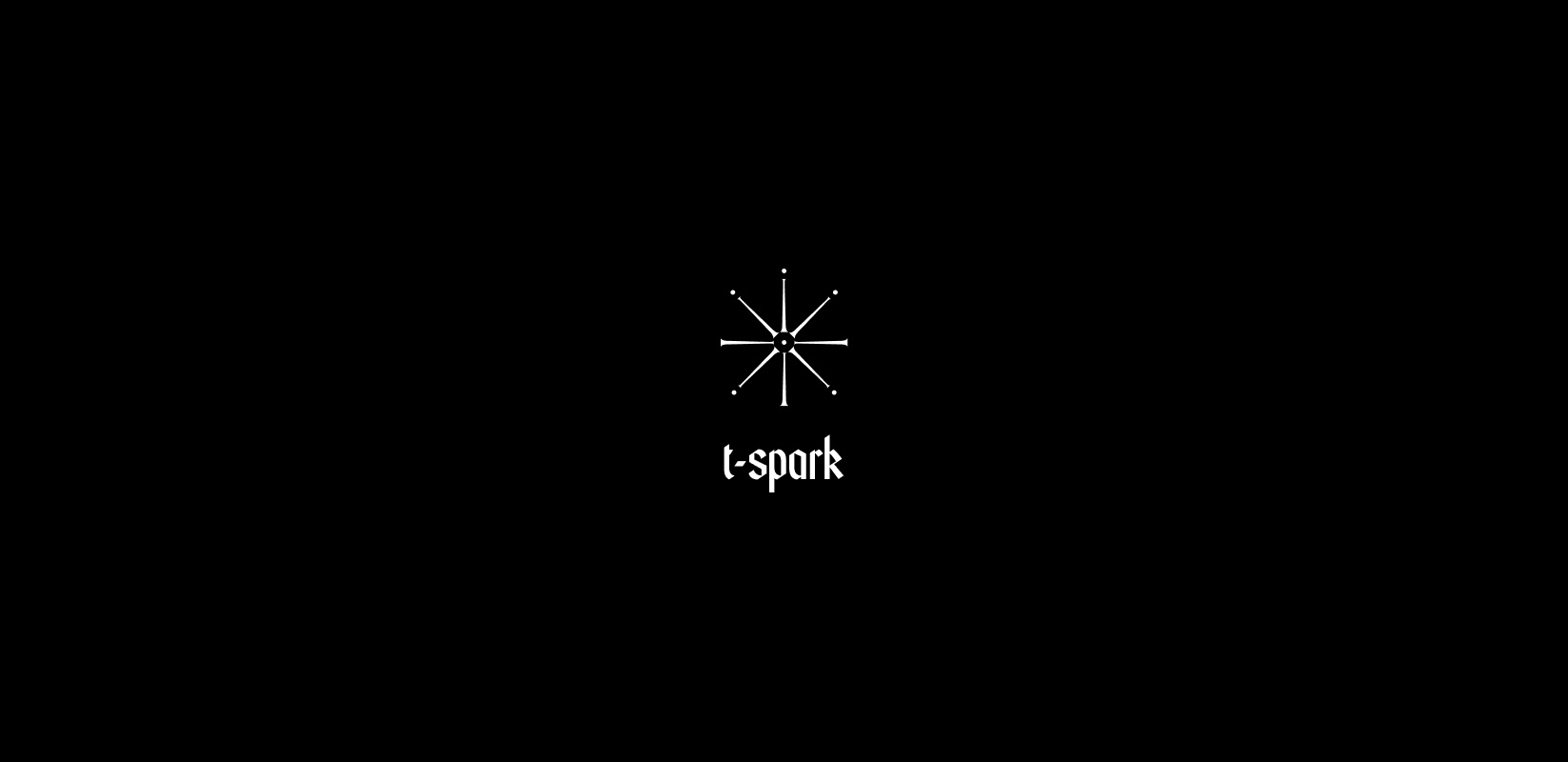 The t-spark asterisk mark above the wordmark on black